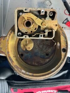 door lock internal mechanism exposed during professional locksmith repair service